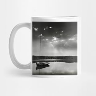 A moored yacht in calm waters at Brancaster Staithe, Norfolk, UK Mug